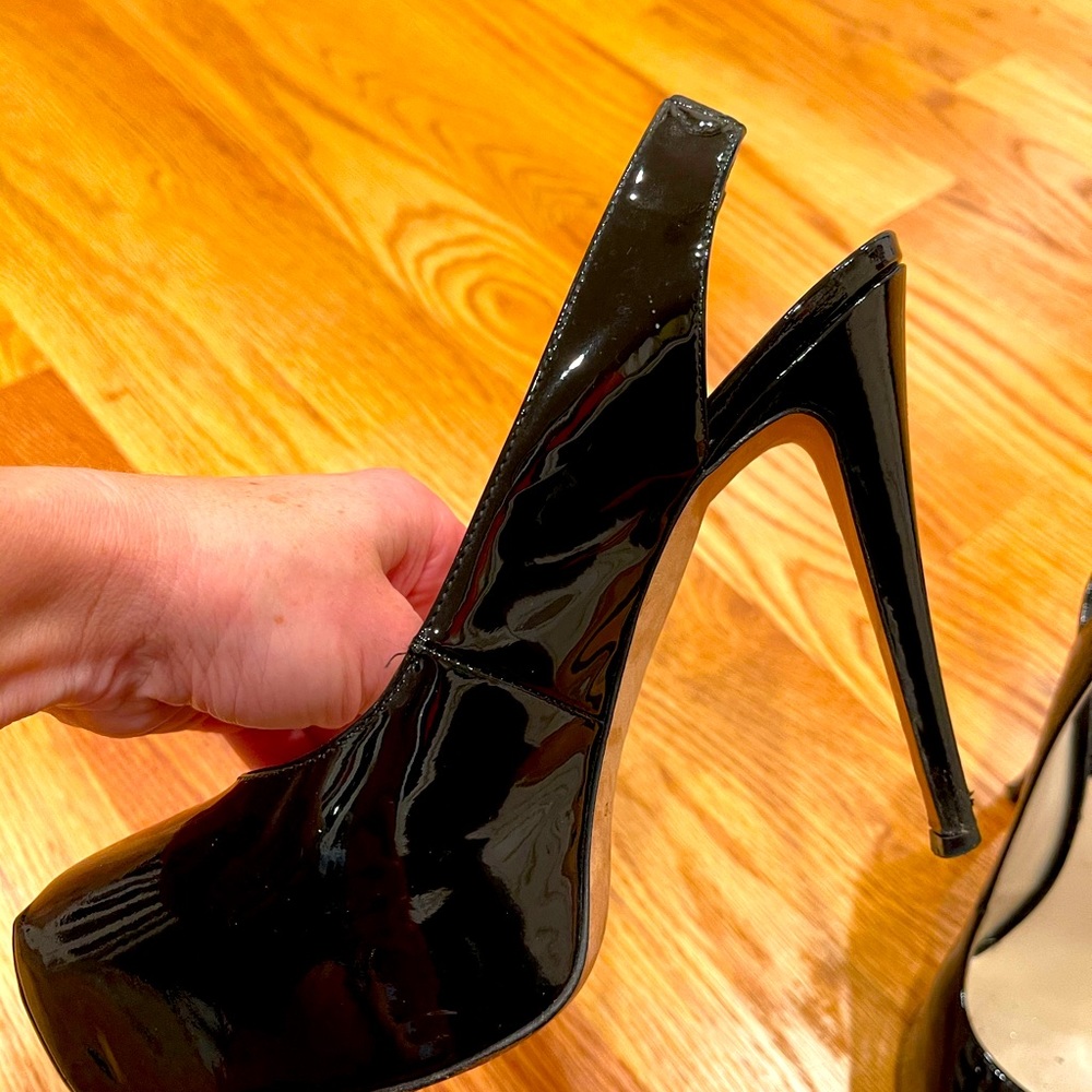 Brian Atwood black patent leather pumps